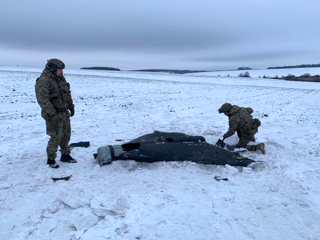 Ukrainian police inspect a recovered Russian Geran attack drone